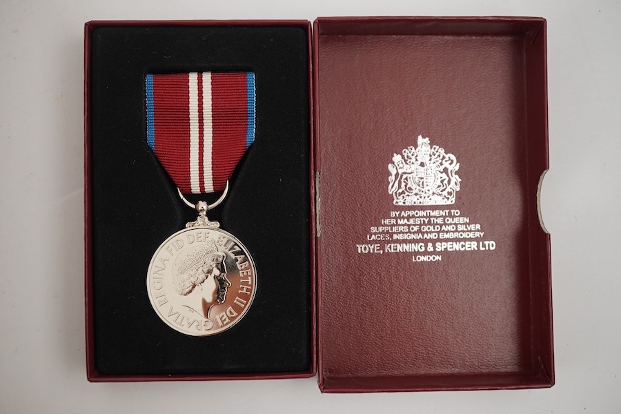 A collection of medal related items, etc., including